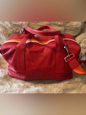 Roots | Sporty Pebbled Red Leather Handbag Duffel with Orange White Accent Women